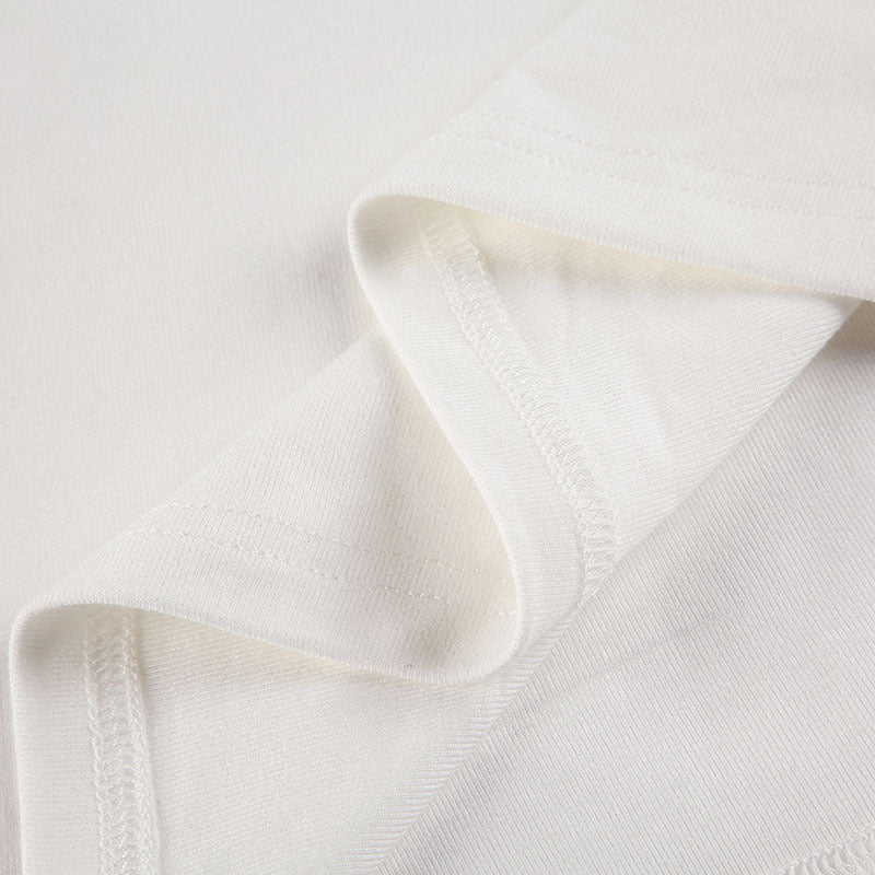 ASYMMETRISCHES OFF-SHOULDER-TOP – MODERNER UND FEMININER CHIC
