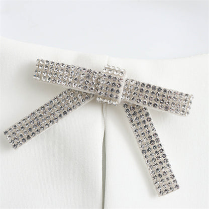 ELEGANTES HALTERTOP MIT SCHMUCKDETAILS – GLAMOURÖS